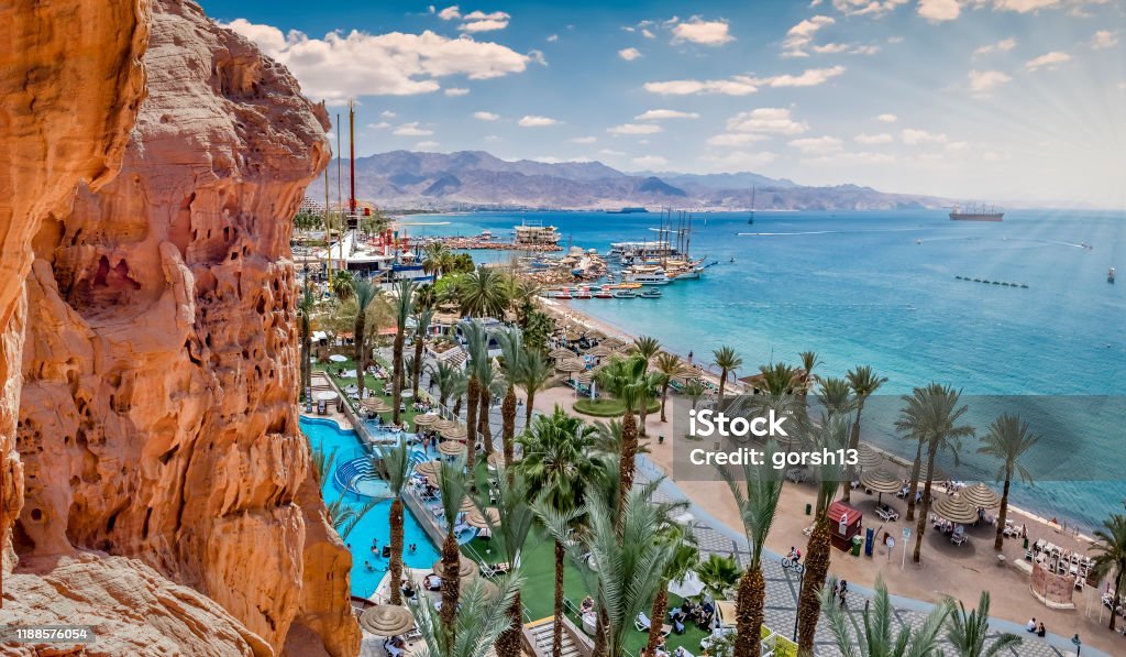 Eilat is Israeli southernmost tourist and resort city, located on the northern shores of the Red Sea, concept of blissful and happy vacation